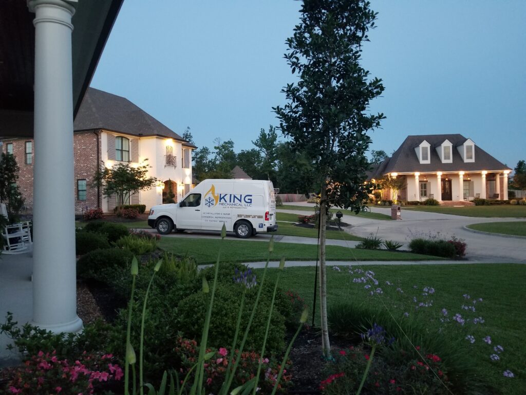 A King Mechanical van visiting a residential home for service.