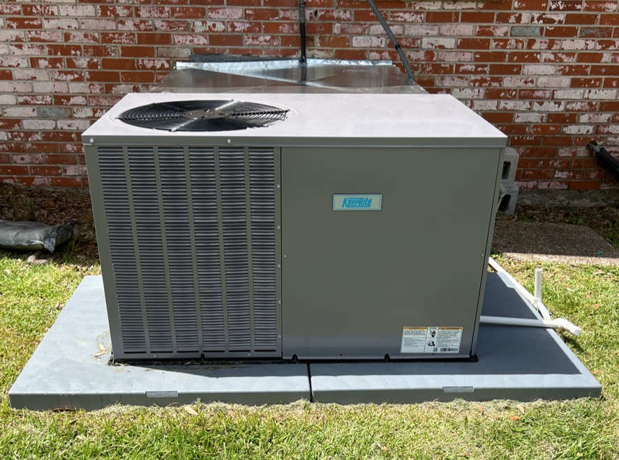 A Keeprite air conditioning unit located outside of a home.